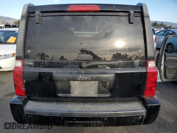✅ 2007 Jeep Commander Sport • VIN: 1J8HH48K57C587581 • Лот: 80295183. Опубликован ранее на Copart с пробегом 230 660 миль. Бесплатный доступ к архиву аукционных продаж из США и подробный отчёт об истории автомобиля на DreamBid. Изображение 6.