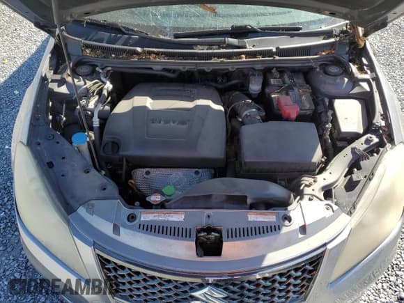 ✅ 2012 Suzuki Kizashi SE • VIN: JS2RF9A36C6100226 • Lot: 49574445. Listed on Copart with 160,071 mi. Free auction sales archive from the USA and detailed vehicle history report at DreamBid. Image 11.