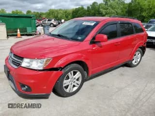 ✅ 2012 Dodge Journey SXT • VIN: 3C4PDCBB2CT323329 • Lot: 56891385. Listed on Copart with 139,027 mi. Free auction sales archive from the USA and detailed vehicle history report at DreamBid. Image 1.