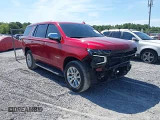 2023 Chevrolet Tahoe Premier z VIN 1GNSKSKD3PR142256, wystawiony jako IAAI lot #42593418 z przebiegiem 49 160 mil mil oraz . Historia ofert i sprzedaży dostępna na DreamBid. Obrazek 1.