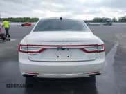 ✅ 2018 Lincoln Continental Reserve • VIN: 1LN6L9NC9J5616871 • Lot: 43531515. Wystawiony na IAAI z przebiegiem 58 745 mil. Bezpłatny archiwum sprzedaży aukcyjnych z USA i szczegółowy raport historii pojazdu na DreamBid. Zdjęcie 16.