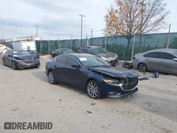 ✅ 2022 Mazda 3 Select • VIN: 3MZBPABL3NM309450 • Lot: 43650319. Listed on IAAI with 32,846 mi. Free auction sales archive from the USA and detailed vehicle history report at DreamBid. Image 1.