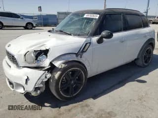 ✅ 2013 MINI Countryman S • VIN: WMWZC3C5XDWP22342 • Lot: 68136345. Listed on Copart with 104,441 mi. Free auction sales archive from the USA and detailed vehicle history report at DreamBid. Image 1.