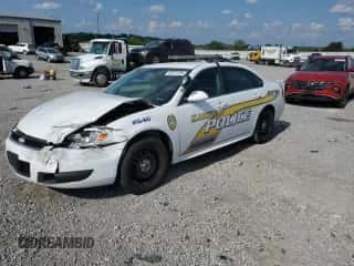 2014 Chevrolet Impala Police Police with VIN 2G1WD5E3XE1112646, listed as a Copart auction lot 68311335 with 131,920 mi miles and Salvage title. Bid and sale history available at DreamBid. Image 1.