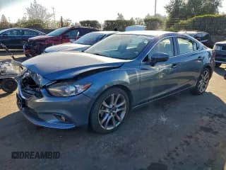 ✅ 2015 Mazda 6 i Grand Touring • VIN: JM1GJ1W5XF1208538 • Lot: 95839975. Listed on Copart with 149,478 mi. Free auction sales archive from the USA and detailed vehicle history report at DreamBid. Image 1.