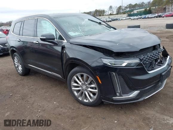 ✅ 2021 Cadillac XT6 Premium Luxury • VIN: 1GYKPCRSXMZ222454 • Lot: 41648439. Listed on IAAI with 113,547 mi. Free auction sales archive from the USA and detailed vehicle history report at DreamBid. Image 1.