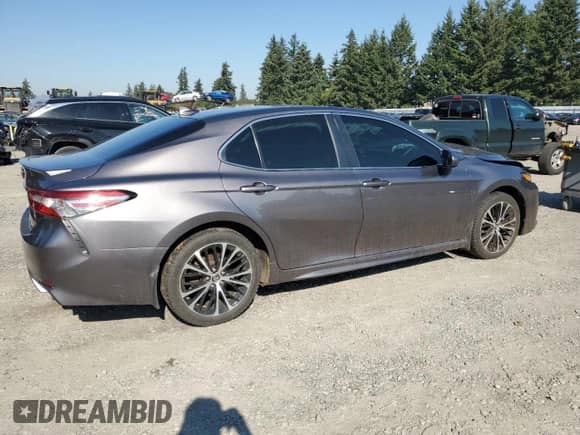 2019 Toyota Camry LE z VIN 4T1B11HK6KU735056, wystawiony jako Copart lot #82243775 z przebiegiem 111 013 mil mil oraz Szkoda całkowita • Salvage title. Historia ofert i sprzedaży dostępna na DreamBid. Obrazek 3.