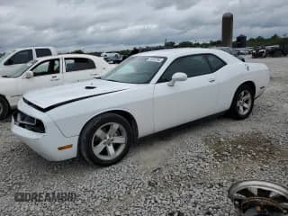 ✅ 2014 Dodge Challenger SXT • VIN: 2C3CDYAG9EH266880 • Lot: 70292794. Wystawiony na Copart z przebiegiem 196 813 mil. Bezpłatny archiwum sprzedaży aukcyjnych z USA i szczegółowy raport historii pojazdu na DreamBid. Zdjęcie 1.
