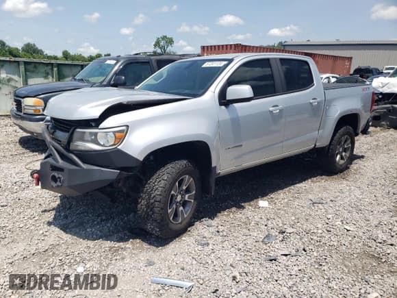 ✅ 2018 Chevrolet Colorado 4WD Z71 • VIN: 1GCGTDEN8J1149303 • Лот: 57241124. Опубликован ранее на Copart с пробегом 113 724 миль. Бесплатный доступ к архиву аукционных продаж из США и подробный отчёт об истории автомобиля на DreamBid. Изображение 1.
