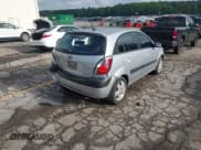 ✅ 2009 Kia Rio LX • VIN: KNADE243X96580822 • Lot: 42298525. Wystawiony na IAAI z przebiegiem 157 013 mil. Bezpłatny archiwum sprzedaży aukcyjnych z USA i szczegółowy raport historii pojazdu na DreamBid. Zdjęcie 4.