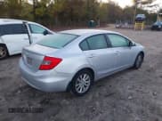 ✅ 2012 Honda Civic EX • VIN: 19XFB2F89CE103099 • Lot: 43591638. Listed on IAAI with 207,310 mi. Free auction sales archive from the USA and detailed vehicle history report at DreamBid. Image 4.