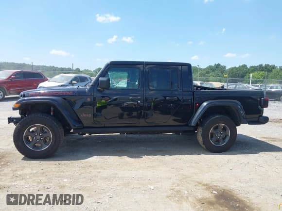 ✅ 2022 Jeep Gladiator Rubicon • VIN: 1C6JJTBM8NL169120 • Lot: 42573845. Listed on IAAI with 47,678 mi. Free auction sales archive from the USA and detailed vehicle history report at DreamBid. Image 14.
