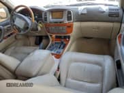 ✅ 2003 Lexus LX 470 • VIN: JTJHT00W033528099 • Lot: 94275515. Wystawiony na Copart z przebiegiem 395 291 mil. Bezpłatny archiwum sprzedaży aukcyjnych z USA i szczegółowy raport historii pojazdu na DreamBid. Zdjęcie 8.