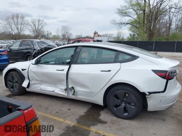 ✅ 2023 Tesla Model 3 • VIN: 5YJ3E1EA9PF569415 • Lot: 41941427. Listed on IAAI with 19,834 mi. Free auction sales archive from the USA and detailed vehicle history report at DreamBid. Image 14.