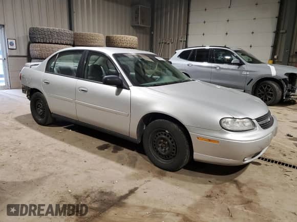 2003 Chevrolet Malibu with VIN 1G1ND52J03M726041, listed as a Copart auction lot 43620755 with 101,467 mi miles and Salvage title. Bid and sale history available at DreamBid. Image 4.