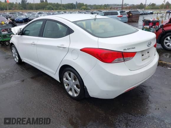 2013 Hyundai Elantra Limited z VIN 5NPDH4AE2DH158831, wystawiony jako IAAI lot #43355202 z przebiegiem 149 589 mil mil oraz . Historia ofert i sprzedaży dostępna na DreamBid. Obrazek 3.