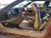 1986 Chevrolet Corvette with VIN 1G1YY0789G5118657, listed as a Copart auction lot 77743794 with 97,673 mi miles and Salvage title. Bid and sale history available at DreamBid. Image 7.