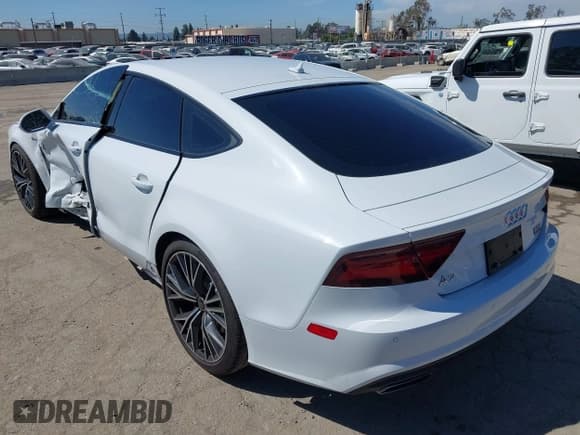 ✅ 2018 Audi A7 Premium Plus • VIN: WAUW3AFCXJN052570 • Лот: 41990238. Опубликован ранее на IAAI с пробегом 53 810 миль. Бесплатный доступ к архиву аукционных продаж из США и подробный отчёт об истории автомобиля на DreamBid. Изображение 3.