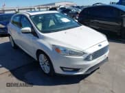 ✅ 2018 Ford Focus Titanium • VIN: 1FADP3N26JL271708 • Lot: 43531238. Listed on IAAI with 154,503 mi. Free auction sales archive from the USA and detailed vehicle history report at DreamBid. Image 1.