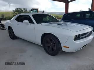 2012 Dodge Challenger SXT z VIN 2C3CDYAG2CH280908, wystawiony jako IAAI lot #43401449 z przebiegiem 160 154 mil mil oraz . Historia ofert i sprzedaży dostępna na DreamBid. Obrazek 1.