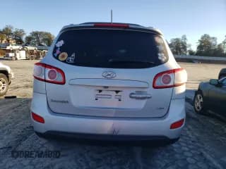 ✅ 2012 Hyundai Santa Fe Limited • VIN: 5XYZK4AG9CG113819 • Лот: 90697815. Опубликован ранее на Copart с пробегом 233 508 миль. Бесплатный доступ к архиву аукционных продаж из США и подробный отчёт об истории автомобиля на DreamBid. Изображение 6.