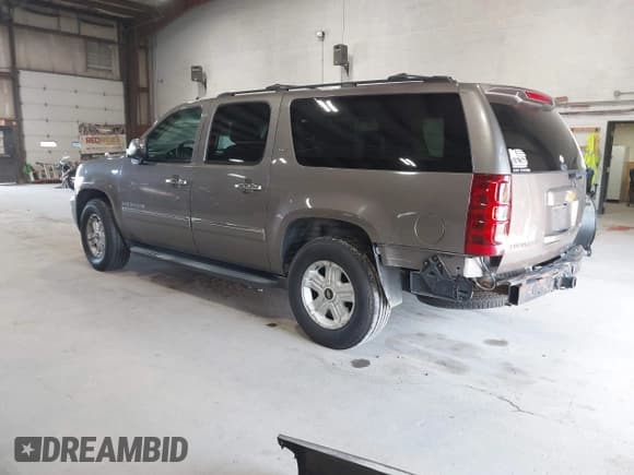 ✅ 2012 Chevrolet Suburban LTZ • VIN: 1GNSKKE74CR278704 • Lot: 43004708. Listed on IAAI with 203,840 mi. Free auction sales archive from the USA and detailed vehicle history report at DreamBid. Image 3.