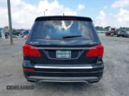 ✅ 2015 Mercedes-Benz GL 450 • VIN: 4JGDF6EEXFA483213 • Lot: 43252141. Listed on IAAI with 129,633 mi. Free auction sales archive from the USA and detailed vehicle history report at DreamBid. Image 17.