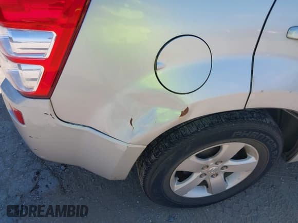 ✅ 2006 Suzuki Grand Vitara Premium • VIN: JS3TE943864103189 • Lot: 43005892. Wystawiony na IAAI z przebiegiem 190 446 mil. Bezpłatny archiwum sprzedaży aukcyjnych z USA i szczegółowy raport historii pojazdu na DreamBid. Zdjęcie 6.