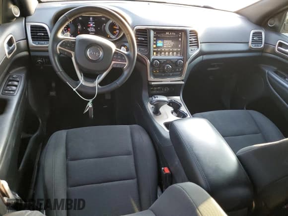 ✅ 2015 Jeep Grand Cherokee Laredo • VIN: 1C4RJEAG2FC707086 • Lot: 84167785. Listed on Copart with 100,035 mi. Free auction sales archive from the USA and detailed vehicle history report at DreamBid. Image 8.