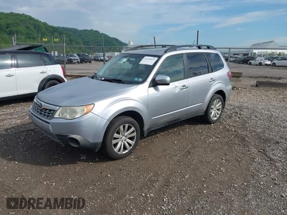 ✅ 2012 Subaru Forester X Premium • VIN: JF2SHBDC1CH451091 • Lot: 42228416. Listed on IAAI with 151,800 mi. Free auction sales archive from the USA and detailed vehicle history report at DreamBid. Image 2.
