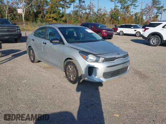 ✅ 2018 Kia Rio S • VIN: 3KPA24AB0JE079409 • Lot: 43753294. Listed on IAAI with 111,953 mi. Free auction sales archive from the USA and detailed vehicle history report at DreamBid. Image 1.