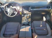 ✅ 2014 Volkswagen Touareg Exec • VIN: WVGEP9BP4ED004709 • Лот: 94182655. Опубликован ранее на Copart с пробегом Не указан. Бесплатный доступ к архиву аукционных продаж из США и подробный отчёт об истории автомобиля на DreamBid. Изображение 8.