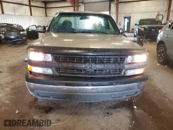 2002 Chevrolet Silverado 1500 z VIN 1GCEC14V02Z272202, wystawiony jako Copart lot #71356385 z przebiegiem 115 544 mil mil oraz Czysty tytuł • Clean title. Historia ofert i sprzedaży dostępna na DreamBid. Obrazek 5.