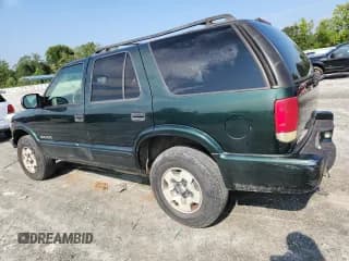 ✅ 2002 Chevrolet Blazer LS • VIN: 1GNDT13W42K208122 • Lot: 69121565. Wystawiony na Copart z przebiegiem 111 706 mil. Bezpłatny archiwum sprzedaży aukcyjnych z USA i szczegółowy raport historii pojazdu na DreamBid. Zdjęcie 2.