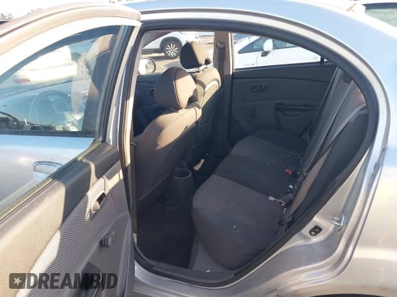✅ 2010 Kia Rio LX • VIN: KNADH4A38A6673706 • Lot: 43645629. Listed on IAAI with 145,094 mi. Free auction sales archive from the USA and detailed vehicle history report at DreamBid. Image 8.