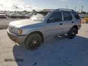 ✅ 2000 Isuzu Rodeo • VIN: 4S2CK58D3Y4306971 • Лот: 68895405. Опубликован ранее на Copart с пробегом Не указан. Бесплатный доступ к архиву аукционных продаж из США и подробный отчёт об истории автомобиля на DreamBid. Изображение 1.