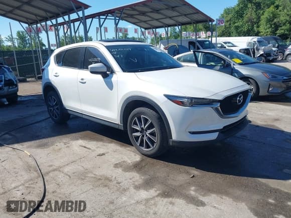 ✅ 2017 Mazda CX-5 Grand Touring • VIN: JM3KFBDL4H0188600 • Lot: 42202079. Listed on IAAI with 101,157 mi. Free auction sales archive from the USA and detailed vehicle history report at DreamBid. Image 1.