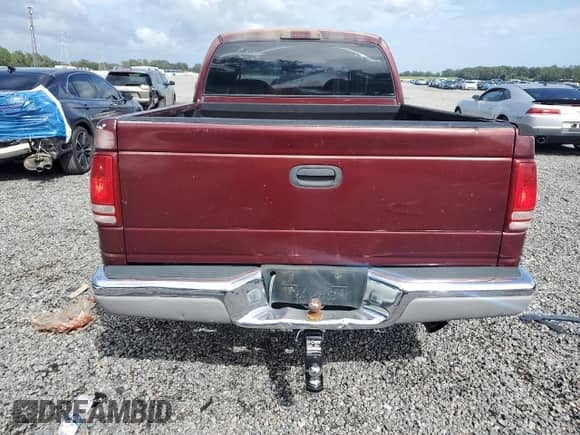 2002 Dodge Dakota SLT z VIN 1B7HL48X62S662174, wystawiony jako Copart lot #84585345 z przebiegiem 213 924 mil mil oraz Szkoda całkowita • Salvage title. Historia ofert i sprzedaży dostępna na DreamBid. Obrazek 6.