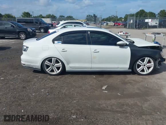 ✅ 2017 Volkswagen Jetta GLI • VIN: 3VW5T7AJ2HM321170 • Lot: 43364539. Listed on IAAI with 185,341 mi. Free auction sales archive from the USA and detailed vehicle history report at DreamBid. Image 13.