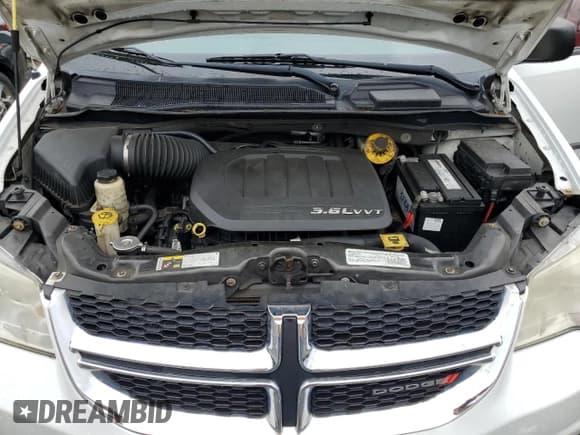 ✅ 2014 Dodge Grand Caravan SE • VIN: 2C4RDGBG4ER261188 • Лот: 62552865. Опубликован ранее на Copart с пробегом 168 335 миль. Бесплатный доступ к архиву аукционных продаж из США и подробный отчёт об истории автомобиля на DreamBid. Изображение 12.