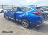 ✅ 2021 Honda CR-V Touring • VIN: 7FARW2H93ME003460 • Lot: 42407842. Listed on IAAI with 32,341 mi. Free auction sales archive from the USA and detailed vehicle history report at DreamBid. Image 3.