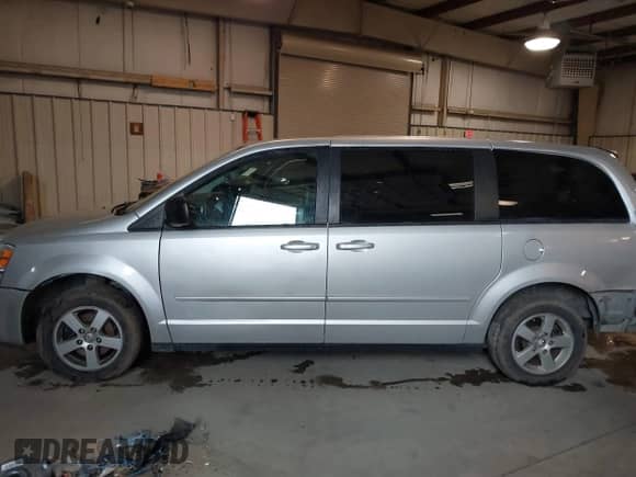 2010 Dodge Grand Caravan SE with VIN 2D4RN4DE3AR341120, listed as a IAAI auction lot 41617770 with 128,849 mi miles and . Bid and sale history available at DreamBid. Image 14.