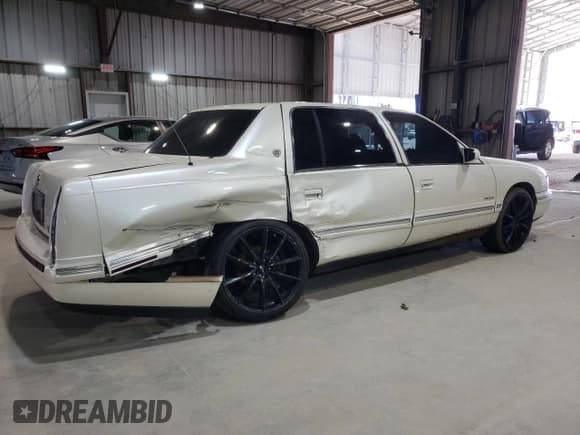 ✅ 1997 Cadillac DeVille • VIN: 1G6KD52YXVU220830 • Lot: 51472905. Listed on Copart with Not provided. Free auction sales archive from the USA and detailed vehicle history report at DreamBid. Image 3.