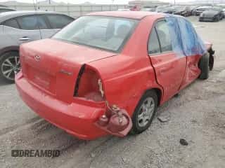 2004 Hyundai Accent GL с VIN KMHCG45C34U567946, выставлен на аукционе Copart как лот 62791465 с пробегом 30 210 миль миль и Списание • Salvage title. История ставок и продаж доступна на DreamBid. Изображение 3.