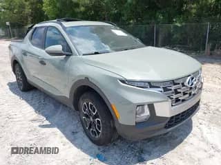 2023 Hyundai Santa Cruz SEL z VIN 5NTJCDAE5PH071108, wystawiony jako IAAI lot #42675034 z przebiegiem 42 478 mil mil oraz . Historia ofert i sprzedaży dostępna na DreamBid. Obrazek 1.