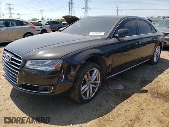 ✅ 2015 Audi A8 3.0L TDI • VIN: WAU3MAFD2FN006795 • Lot: 51791283. Listed on Copart with 106,415 mi. Free auction sales archive from the USA and detailed vehicle history report at DreamBid. Image 1.