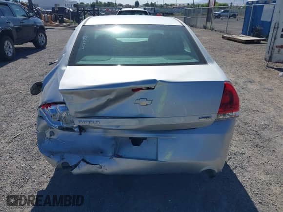 2013 Chevrolet Impala LS z VIN 2G1WF5E35D1265220, wystawiony jako IAAI lot #42559869 z przebiegiem 124 046 mil mil oraz . Historia ofert i sprzedaży dostępna na DreamBid. Obrazek 16.