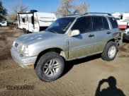 ✅ 1999 Suzuki Grand Vitara JLX • VIN: JS3TD62V0X4113058 • Лот: 80089884. Опубликован ранее на Copart с пробегом 165 794 миль. Бесплатный доступ к архиву аукционных продаж из США и подробный отчёт об истории автомобиля на DreamBid. Изображение 1.