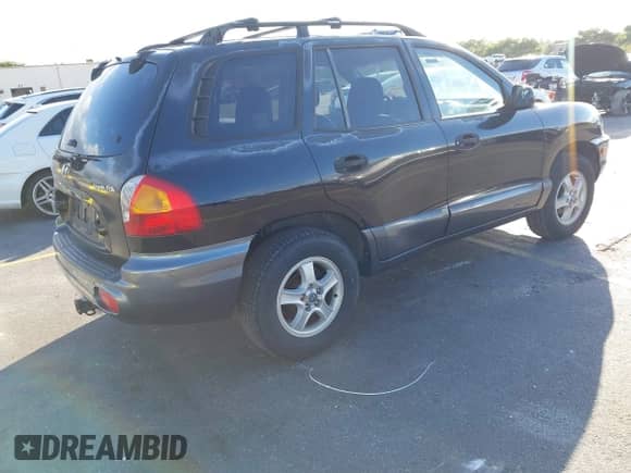 2004 Hyundai Santa Fe z VIN KM8SB12B54U636883, wystawiony jako IAAI lot #41417445 z przebiegiem 91 669 mil mil oraz . Historia ofert i sprzedaży dostępna na DreamBid. Obrazek 4.