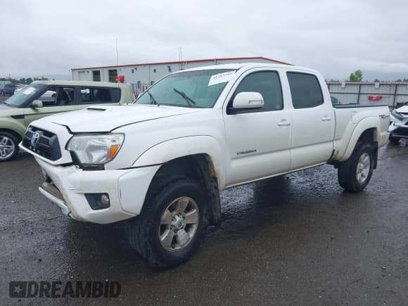✅ 2015 Toyota Tacoma • VIN: 3TMMU4FN6FM083598 • Lot: 42283585. Listed on IAAI with 159,087 mi. Free auction sales archive from the USA and detailed vehicle history report at DreamBid. Image 2.